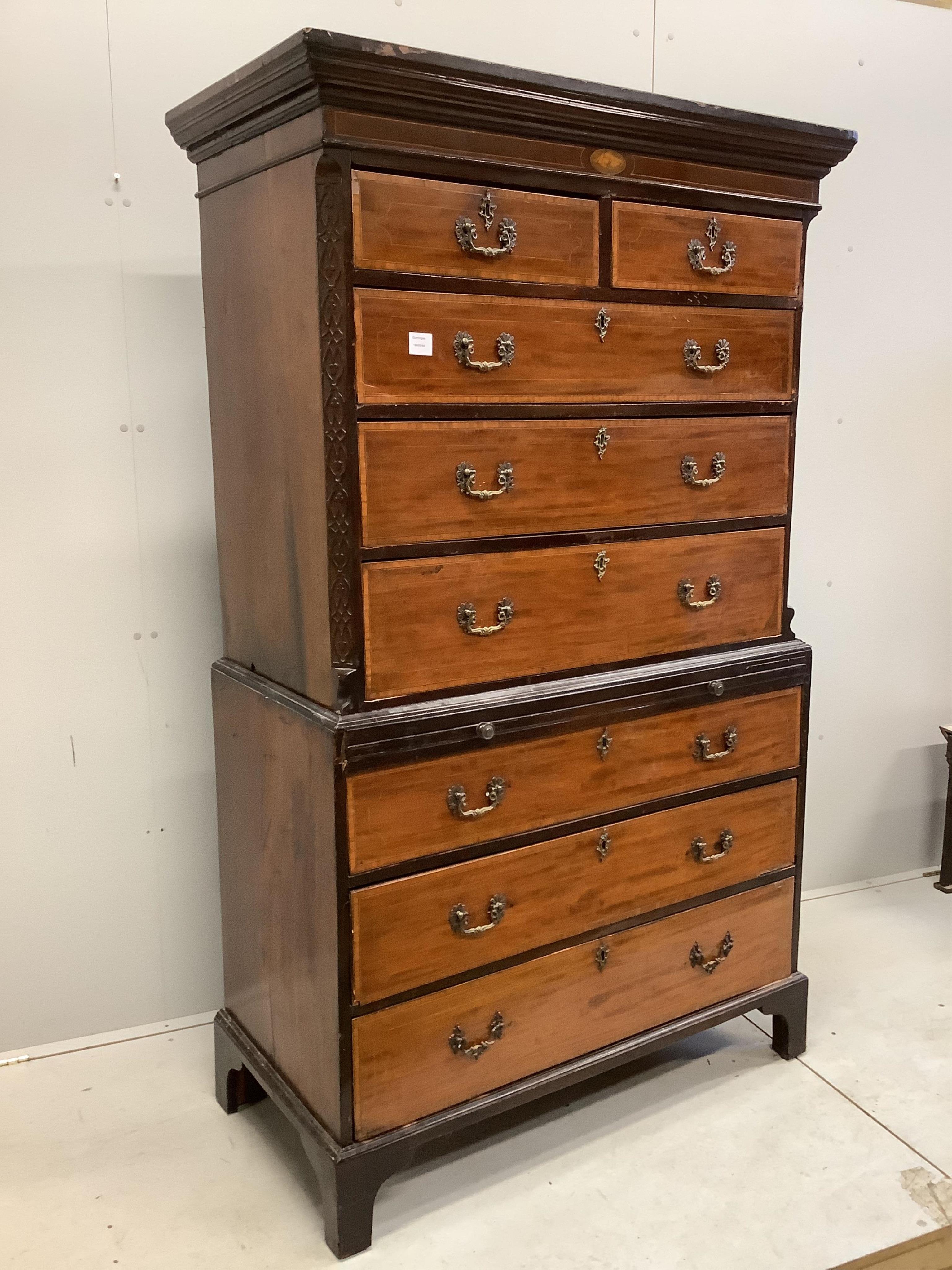 A George III satinwood banded mahogany chest on chest, width 110cm, depth 56cm, height 186cm. Condition - poor to fair